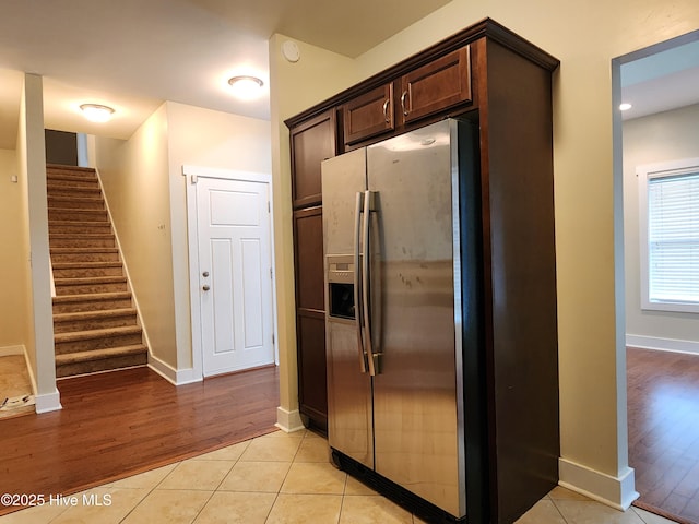 205 Channel Marker Loop, Swansboro, NC 28584 - kitchen featuring stainless steel fridge, dark brown cabinetry, and light wood-style flooring
