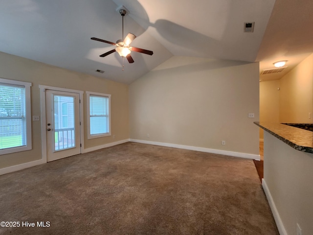 205 Channel Marker Loop, Swansboro, NC 28584 - unfurnished living room featuring carpet flooring, ceiling fan, and lofted ceiling
