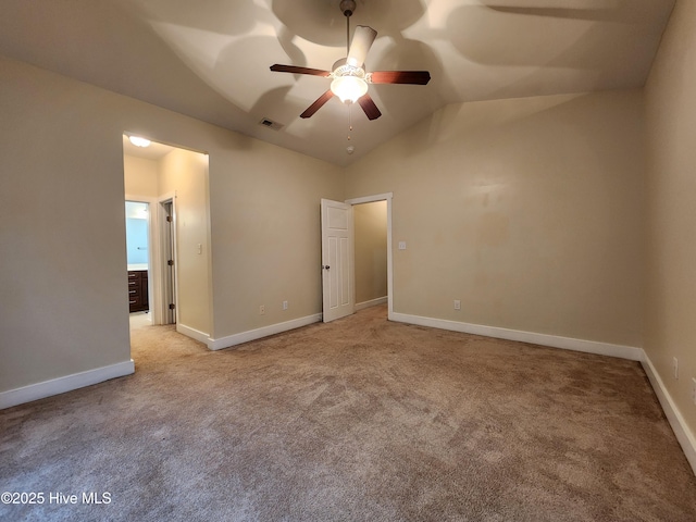 205 Channel Marker Loop, Swansboro, NC 28584 - unfurnished bedroom featuring light colored carpet, vaulted ceiling, and a ceiling fan