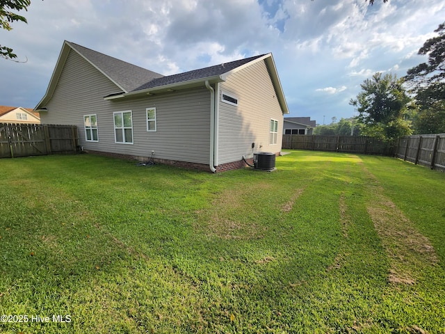 205 Channel Marker Loop, Swansboro, NC 28584 - rear view of property with a fenced backyard and roof with shingles