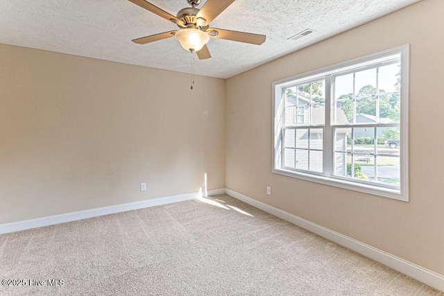 3 S Ct, Pinehurst, NC 28374 - carpeted spare room with a textured ceiling and a ceiling fan