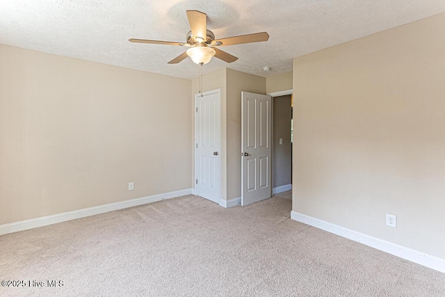 3 S Ct, Pinehurst, NC 28374 - spare room with a ceiling fan, light carpet, and a textured ceiling