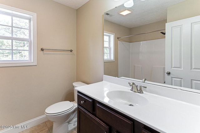 3 S Ct, Pinehurst, NC 28374 - bathroom with vanity, healthy amount of natural light, tile patterned floors, and a shower
