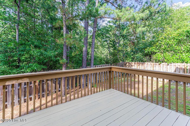 3 S Ct, Pinehurst, NC 28374 - wooden deck featuring a fenced backyard