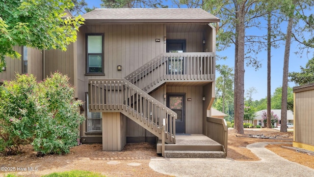 800 Saint Andrews Dr # 156, Pinehurst, NC 28374 - view of front of home featuring roof with shingles and stairway