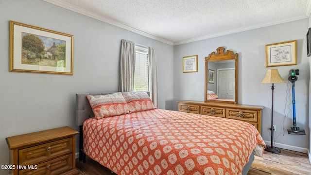 800 Saint Andrews Dr # 156, Pinehurst, NC 28374 - bedroom with wood finished floors, crown molding, and a textured ceiling