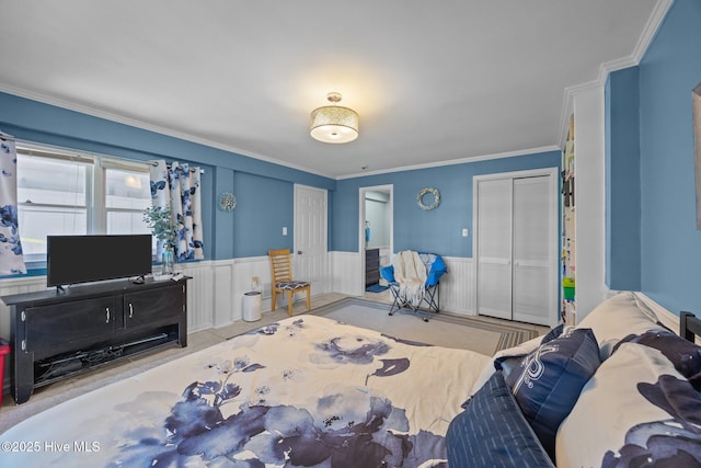 117 Forecastle Ct, Washington, NC 27889 - bedroom featuring a wainscoted wall, a closet, and crown molding