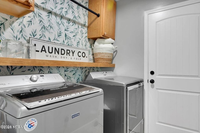 939 Dynamo Ln, Jacksonville, NC 28546 - washroom with cabinet space and washer and dryer
