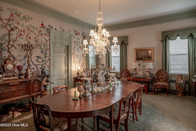 900 Nash St N, Wilson, NC 27893 - carpeted dining space with a chandelier, crown molding, plenty of natural light, and radiator