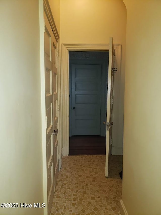 900 Nash St N, Wilson, NC 27893 - hallway featuring light stone finish flooring