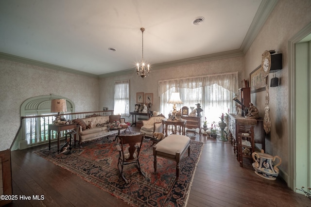 900 Nash St N, Wilson, NC 27893 - living area with hardwood / wood-style flooring, a chandelier, and crown molding
