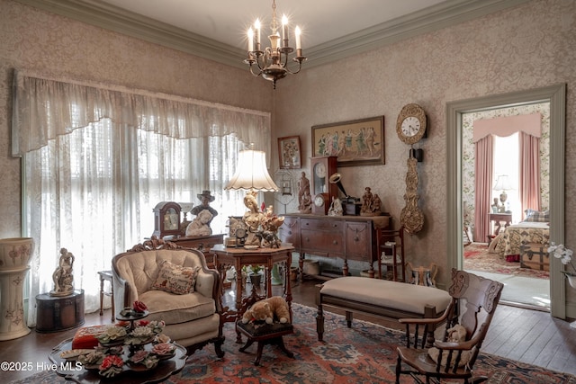 900 Nash St N, Wilson, NC 27893 - living area with crown molding, hardwood / wood-style floors, plenty of natural light, a chandelier, and wallpapered walls