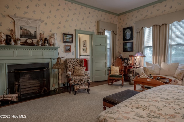 900 Nash St N, Wilson, NC 27893 - bedroom with crown molding, wallpapered walls, and a fireplace
