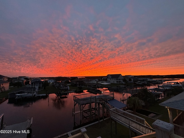 4061 4th St, Surf City, NC 28445 - exterior space featuring a dock and a water view