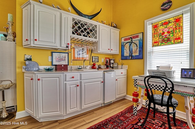 4061 4th St, Surf City, NC 28445 - indoor wet bar with water heater and light wood finished floors