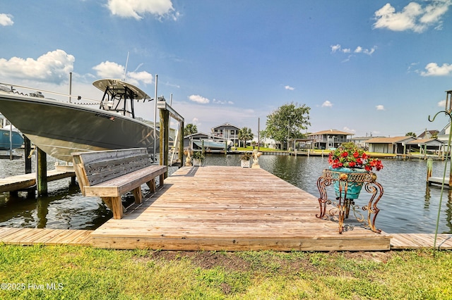 4061 4th St, Surf City, NC 28445 - dock with a water view, boat lift, and a residential view