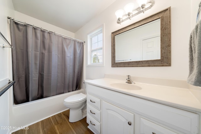 32 S Shelby Rd, Southport, NC 28461 - bathroom featuring vanity, shower / bathtub combination with curtain, and wood finished floors