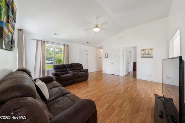 32 S Shelby Rd, Southport, NC 28461 - living area featuring a ceiling fan, vaulted ceiling, and light wood-style floors