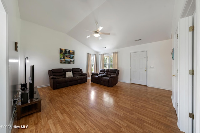 32 S Shelby Rd, Southport, NC 28461 - living area with a ceiling fan, light wood-style floors, and lofted ceiling