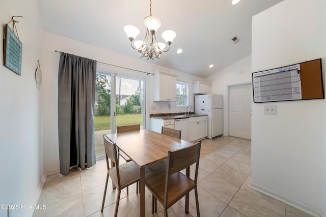 32 S Shelby Rd, Southport, NC 28461 - dining space featuring a chandelier, vaulted ceiling, and recessed lighting