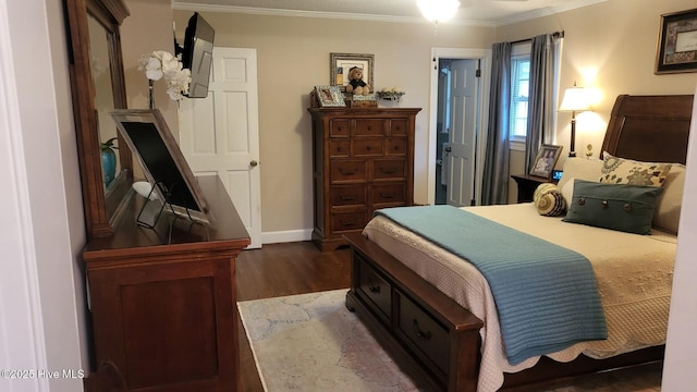2262 Old Oak Rd, Kinston, NC 28504 - bedroom with dark wood-style floors and crown molding