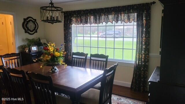 2262 Old Oak Rd, Kinston, NC 28504 - dining room with plenty of natural light and a chandelier