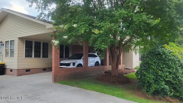 2262 Old Oak Rd, Kinston, NC 28504 - view of home's exterior with crawl space and driveway