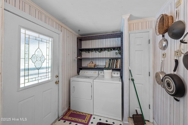 1710 National Ave, New Bern, NC 28560 - laundry area featuring washing machine and dryer, light floors, and wallpapered walls