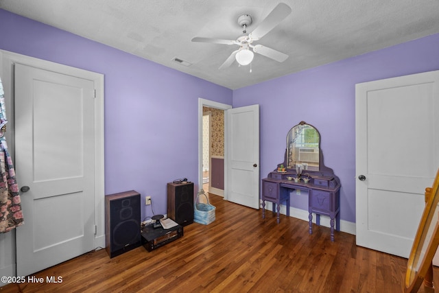 1710 National Ave, New Bern, NC 28560 - bedroom with wood finished floors, ceiling fan, a textured ceiling, and cooling unit