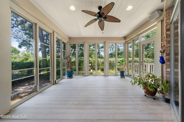 2945 Moorings Way SE, Southport, NC 28461 - unfurnished sunroom featuring ceiling fan and plenty of natural light