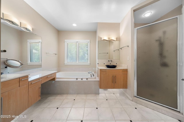 2945 Moorings Way SE, Southport, NC 28461 - full bathroom featuring a stall shower, a garden tub, and two vanities