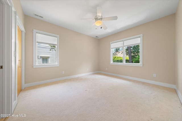 2945 Moorings Way SE, Southport, NC 28461 - spare room featuring light carpet and ceiling fan