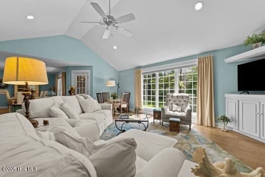 124 Juniper Creek Blvd Unit 16, Pinehurst, NC 28374 - living room with lofted ceiling, wood finished floors, ceiling fan, and recessed lighting