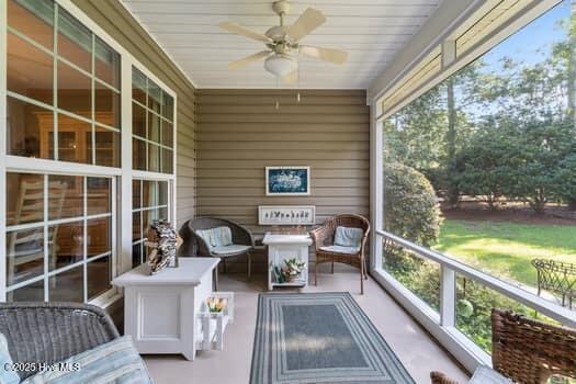 124 Juniper Creek Blvd Unit 16, Pinehurst, NC 28374 - sunroom / solarium with ceiling fan and an outdoor hangout area