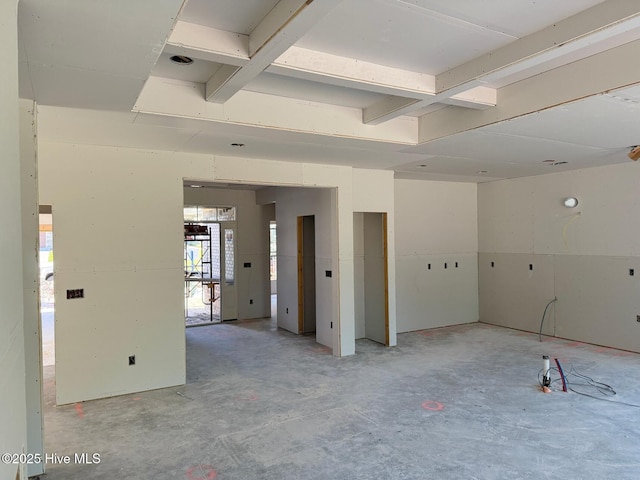 449 Motts Forest Rd Unit 64R, Wilmington, NC 28412 - unfurnished room with unfinished concrete floors and beamed ceiling