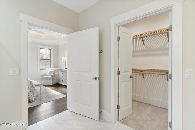 449 Motts Forest Rd Unit 64R, Wilmington, NC 28412 - hallway with a tray ceiling and ornamental molding