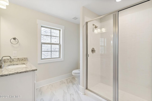 449 Motts Forest Rd Unit 64R, Wilmington, NC 28412 - bathroom featuring a shower stall, vanity, and marble finish floors