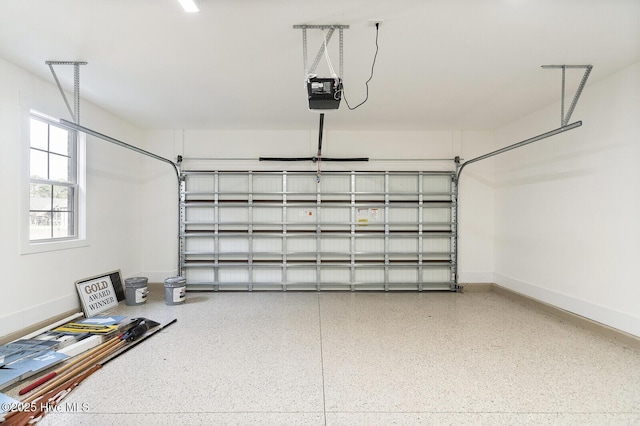 449 Motts Forest Rd Unit 64R, Wilmington, NC 28412 - garage featuring a garage door opener and baseboards