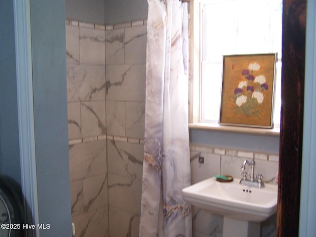 206 Community Rd, Eagle Springs, NC 27242 - bathroom featuring tile walls and curtained shower