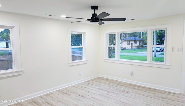 702A Richardson St # A, Elizabeth City, NC 27909 - empty room featuring light wood finished floors, plenty of natural light, and ceiling fan