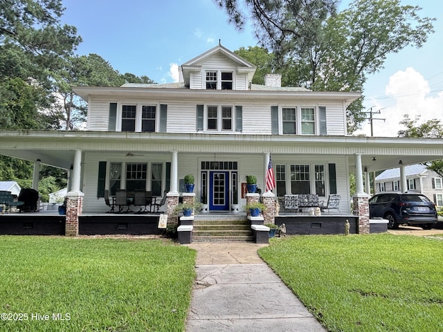 124 W Main St, Woodland, NC 27897 - view of front of house with covered porch, a front lawn, and crawl space