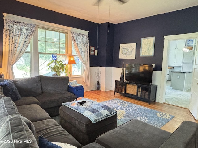 124 W Main St, Woodland, NC 27897 - living area featuring wood finished floors and a ceiling fan