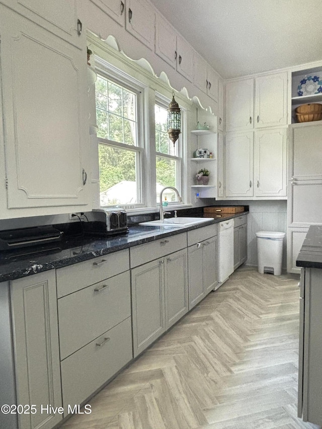124 W Main St, Woodland, NC 27897 - kitchen with open shelves, dishwasher, white cabinetry, and dark stone counters