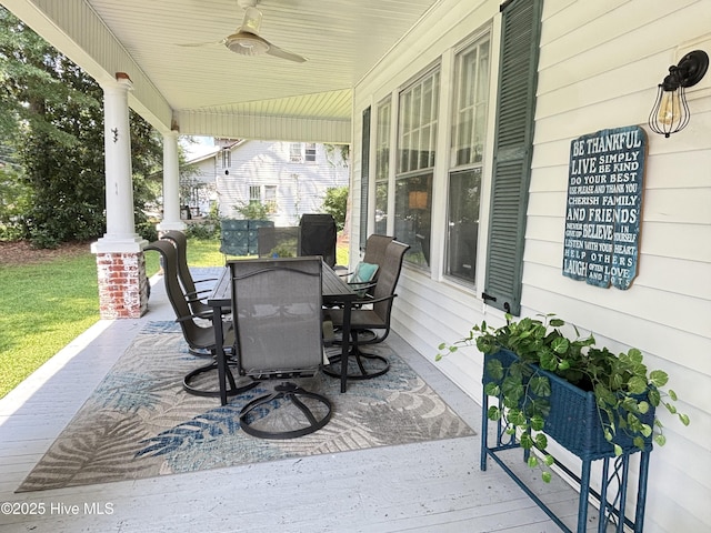 124 W Main St, Woodland, NC 27897 - porch with ceiling fan and outdoor dining space