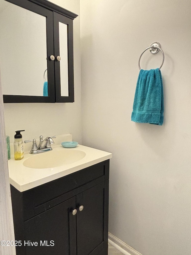 124 W Main St, Woodland, NC 27897 - bathroom featuring vanity and baseboards