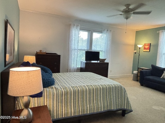 124 W Main St, Woodland, NC 27897 - bedroom featuring crown molding, carpet floors, and a ceiling fan