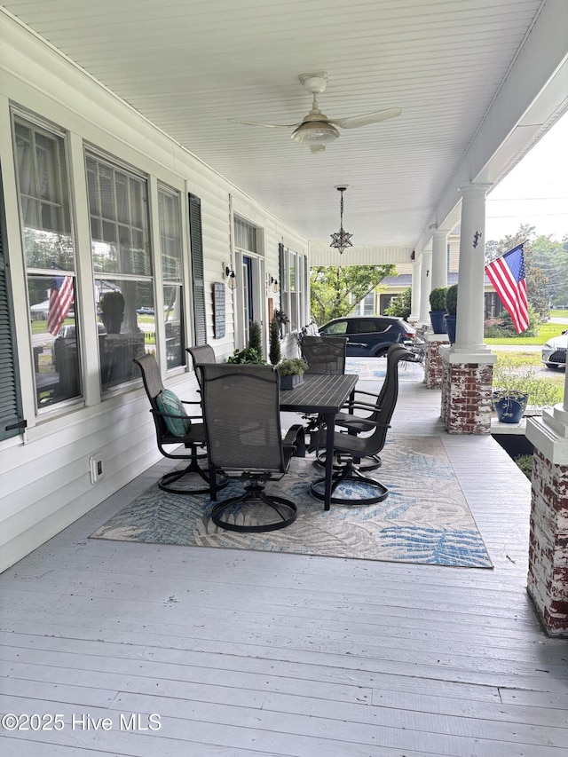 124 W Main St, Woodland, NC 27897 - porch featuring outdoor dining area and a ceiling fan
