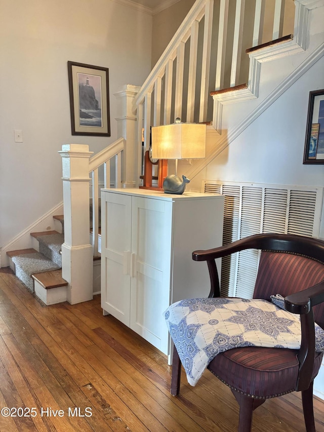 124 W Main St, Woodland, NC 27897 - stairs featuring wood-type flooring and ornamental molding