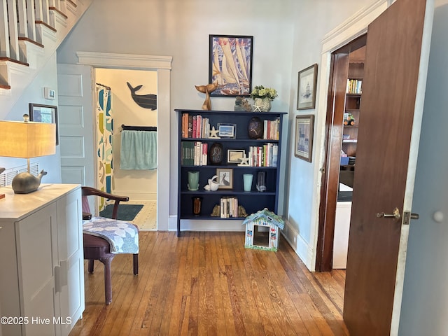 124 W Main St, Woodland, NC 27897 - living area featuring wood-type flooring and stairway