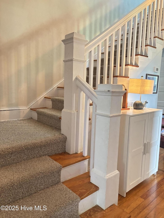124 W Main St, Woodland, NC 27897 - staircase with hardwood / wood-style flooring